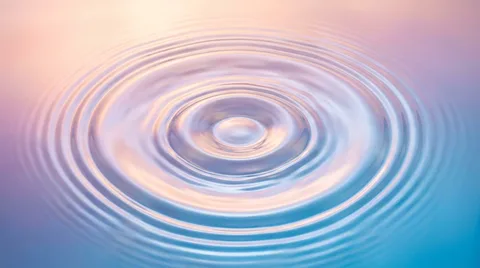 Ripples spreading across still water